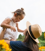 mom and daughter playing