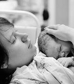 Young breastfeeding mother